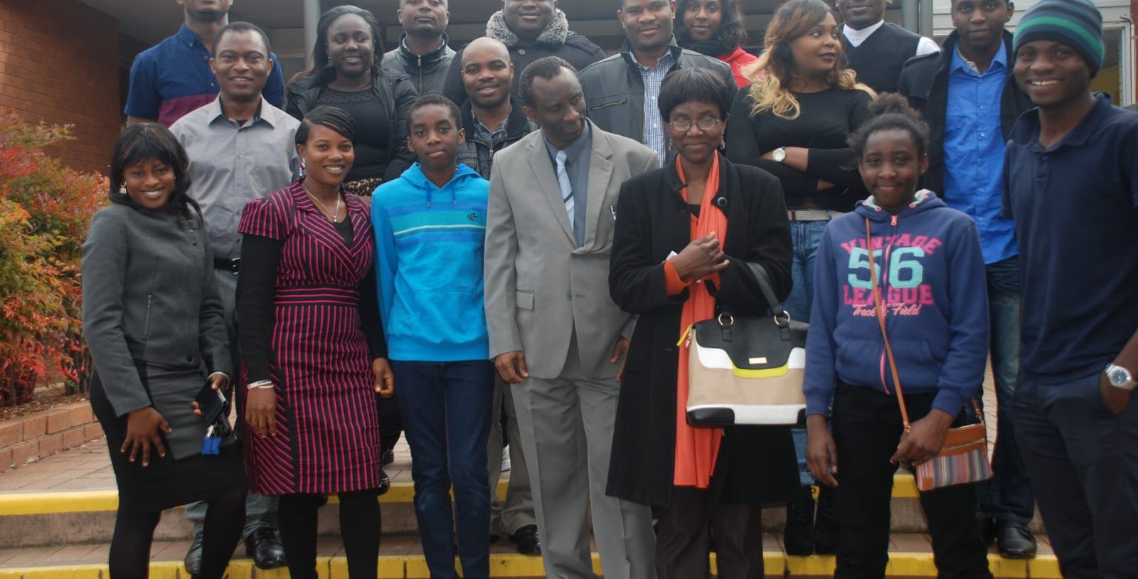 Members and families of the church gathered outside after a service